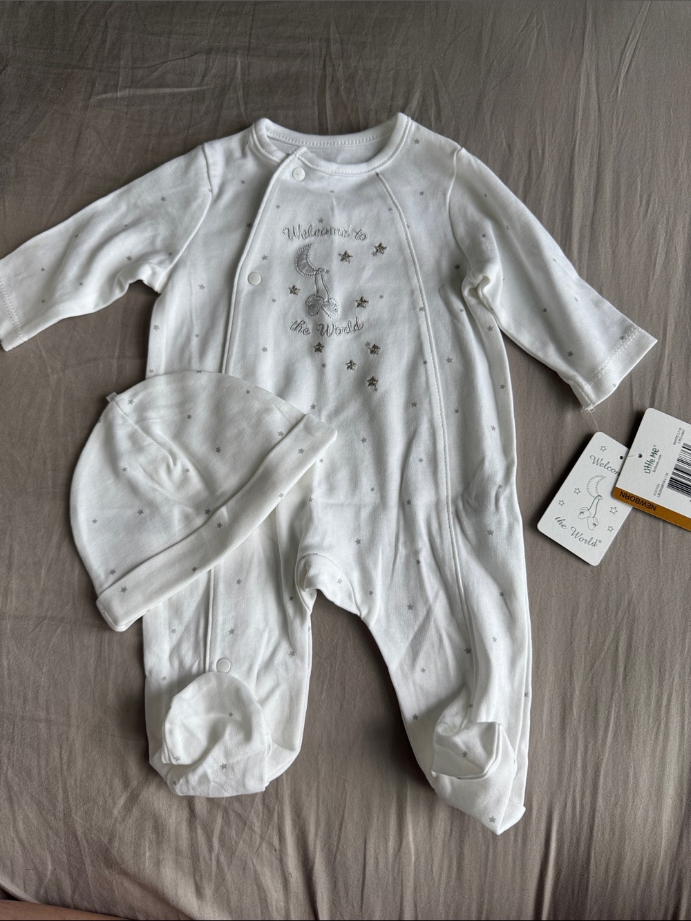 Little Me White Footed One-Piece with Silver Star Detail and Hat